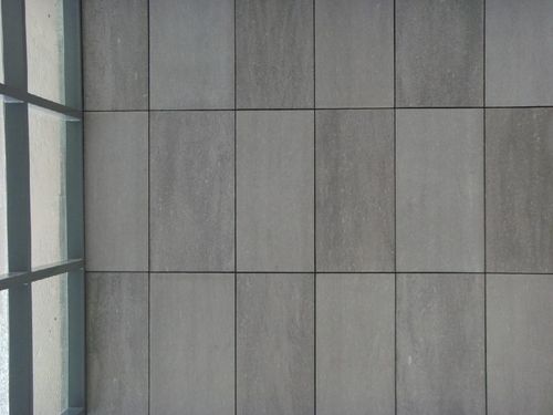 清水混凝土板（1220x2440x8）防水材料特性及其在建筑装饰中的应用